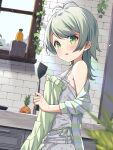  1girl antenna_hair apron bangs bare_shoulders blurry blurry_foreground blush brick_wall camisole commentary_request counter depth_of_field eyebrows_visible_through_hair food frilled_apron frills fruit green_apron green_eyes green_hair highres holding kitchen long_hair looking_at_viewer looking_to_the_side mimura_zaja original parted_lips pineapple skirt smile solo spatula white_camisole white_skirt window 