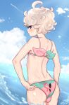  1boy ahoge arched_back bangs bede_(pokemon) bikini bikini_day blonde_hair blurry blush btms666 bulge cloud commentary crossdressing curly_hair day eyebrows_visible_through_hair eyelashes highres male_focus outdoors pokemon pokemon_(game) pokemon_swsh purple_eyes shiny shiny_skin short_hair sky solo sparkle swimsuit wading water water_drop 