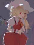  1girl 3: ascot backlighting bangs blonde_hair blush closed_mouth cowboy_shot flandre_scarlet frills from_side grey_background hair_between_eyes hands_up hat highres long_hair looking_away mob_cap nail_polish orange_ascot own_hands_together petticoat pointy_ears puffy_short_sleeves puffy_sleeves red_eyes red_skirt red_vest reddizen ribbon-trimmed_collar ribbon_trim short_sleeves side_ponytail skirt skirt_set slit_pupils solo touhou vest white_headwear wing_collar wrist_cuffs 