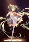  1girl absurdly_long_hair armlet artist_name backlighting ballet ballet_slippers bare_arms bracelet chest_tattoo commentary cupping_hand dancing dark_background darkness dress eyelashes flat_chest floating_hair full_body glint glowing gold_trim green_eyes green_hair hand_on_own_chest hatsune_miku headphones highres jewelry koichame leg_up lens_flare light_particles long_hair looking_at_viewer miku_symphony_(vocaloid) neck_ribbon neck_ring number_tattoo outstretched_hand parted_lips ribbon see-through_dress serious shadow shoe_soles short_dress single_thighhigh solo spotlight standing standing_on_one_leg strapless strapless_dress tattoo thighhighs tiptoes tsurime tutu twintails very_long_hair vocaloid white_dress white_footwear white_legwear zettai_ryouiki 