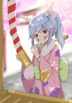 1girl :t absurdres amane_rin animal_ears blue_hair blurry blurry_background blush carrot_hair_ornament day don-chan_(usada_pekora) ema food-themed_hair_ornament hair_ornament hatsumoude highres holding hololive ink_on_face japanese_clothes kimono kouhaku_nawa long_hair long_sleeves multicolored_hair new_year outdoors ponytail rabbit_ears rabbit_girl rabbit_hair_ornament red_eyes rope shimenawa shrine shrine_bell solo thick_eyebrows torii translation_request usada_pekora v-shaped_eyebrows virtual_youtuber white_hair wide_sleeves 