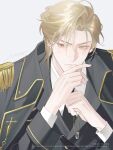  1boy anouchka_cash blonde_hair epaulettes heterochromia highres holding holding_jewelry holding_ring jacket jewelry long_sleeves looking_at_another military_uniform nadph parted_bangs red_eyes ring short_hair solo uniform white_background yellow_eyes zhibo_xie_chun_ai_wen_de_wo_zai_chongzu_feng_shen 