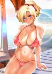  1girl backlighting bangs beach bikini blonde_hair blue_eyes breasts cleavage closed_mouth commentary_request day elle_vianno gundam gundam_zz hair_ribbon halterneck highres huge_breasts looking_at_viewer navel outdoors oyaman photo_background red_bikini red_ribbon ribbon short_hair short_ponytail sitting skindentation smile solo string_bikini swimsuit tan twitter_username 