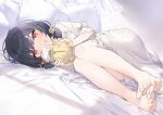 1girl bangs barefoot bed_sheet black_hair commentary_request dress eyebrows_visible_through_hair feet frilled_dress frilled_pillow frills full_body grin hayashi_kewi holding idolmaster idolmaster_shiny_colors knees_up looking_at_viewer low_twintails lying morino_rinze on_side pillow puffy_short_sleeves puffy_sleeves red_eyes short_sleeves short_twintails smile soles solo toenails toes twintails white_dress 