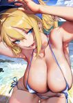  1girl absurdres ahoge artoria_pendragon_(fate) bare_shoulders baseball_cap beach bikini blonde_hair blue_eyes blue_headwear blue_sky blush breasts cleavage collarbone english_commentary fate/grand_order fate_(series) hair_between_eyes hat highres large_breasts long_hair looking_at_viewer mixed-language_commentary mysterious_heroine_xx_(fate) navel ocean ponytail shore sidelocks sky smile solo swimsuit thighs tongue tongue_out waterswing white_bikini 