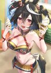 1girl animal_ears bikini black_hair blurry blurry_background blush breasts chumugi cleavage collarbone commentary_request food hair_between_eyes hair_ornament highres horse_ears horse_girl horse_tail ice_cream kitasan_black_(umamusume) looking_at_viewer medium_breasts navel open_mouth red_eyes swimsuit tail umamusume 