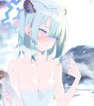  1girl animal_ears bare_shoulders blue_archive blue_hair blush bottle breasts choko_(cup) cleavage cup halo highres mimitoke onsen parted_lips pink_eyes sake_bottle shigure_(blue_archive) short_hair solo towel towel_on_head wet 