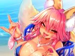 1girl animal_ear_fluff animal_ears beach bikini blue_bikini breasts cleavage collarbone commentary condom eyebrows_visible_through_hair fate/grand_order fate_(series) fox_ears fox_girl fox_tail large_breasts looking_at_viewer ocean open_mouth outdoors pink_hair side-tie_bikini solo swimsuit tail tamamo_(fate) tamamo_no_mae_(swimsuit_lancer)_(fate) tongue tongue_out translated used_condom wisespeak yellow_eyes 