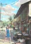  1girl absurdres brown_hair chinese_text chong_feigiap crate hair_ornament hairclip highres original outdoors power_lines school_uniform shoes smile socks solo standing 