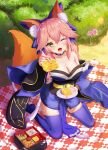  1girl absurdres animal_ear_fluff animal_ears bare_shoulders bento blue_kimono blue_legwear blue_ribbon blush breasts cleavage collarbone dated detached_sleeves die_shao_xian fang fate/extella fate/extra fate/extra_ccc fate/grand_order fate_(series) flower food fox_ears fox_girl fox_tail hair_ribbon highres incoming_food japanese_clothes kimono large_breasts looking_at_viewer nature omelet one_eye_closed open_mouth outdoors picnic pink_hair ribbon sitting skin_fang solo tail tamamo_(fate) tamamo_no_mae_(fate/extra) wariza yellow_eyes 
