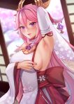  1girl arm_up armpits blurry blurry_background blush breasts closed_mouth commentary depth_of_field detached_sleeves fino_ko gem genshin_impact hair_between_eyes hair_ornament highres indoors japanese_clothes kimono large_breasts long_hair looking_at_viewer miko pink_hair pink_lips purple_eyes sideboob smile solo sweat upper_body very_long_hair wide_sleeves yae_(genshin_impact) 