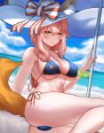  1girl absurdres animal_ear_fluff animal_ears ass bangs beach bikini blue_bikini blue_sky blush bracelet breasts fate/grand_order fate_(series) fox_ears fox_girl fox_tail hat highres jewelry large_breasts long_hair looking_at_viewer ocean pink_hair shirt shore short_sleeves sidelocks sky smile solo straw_hat swimsuit tail tamamo_(fate) tamamo_no_mae_(swimsuit_lancer)_(fate) thighs white_shirt yellow_eyes yong_le_tong_bao 