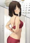  1girl adjusting_underwear arms_behind_back blush bra brown_eyes brown_hair calendar_(object) commentary douki-chan_(douki-chan) from_behind ganbare_douki-chan highres looking_at_viewer messy_hair panties red_bra red_panties short_hair solo underwear underwear_only yomu_(sgt_epper) 