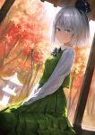  1girl aqua_eyes autumn autumn_leaves black_bow black_bowtie black_hairband black_ribbon bob_cut bow bowtie breasts collared_shirt commentary fjsmu forest green_skirt green_vest hair_ribbon hairband konpaku_youmu long_sleeves looking_at_viewer nature porch ribbon serious shirt short_hair silver_hair skirt skirt_set small_breasts solo stone_lantern touhou vest white_shirt 