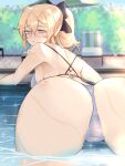  1girl ass blonde_hair blush bow breasts eyebrows_visible_through_hair genshin_impact hair_bow highres jean_(genshin_impact) looking_at_viewer looking_back outdoors parted_lips ponytail puffphox solo swimsuit tied_hair vision_(genshin_impact) 