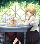  1girl ahoge artoria_pendragon_(fate) bangs black_ribbon black_skirt blonde_hair braid breasts cake collared_shirt commentary creature cup dated english_commentary eyebrows_visible_through_hair fate/grand_order fate_(series) feet_out_of_frame food fou_(fate) french_braid green_eyes hair_bun hair_ribbon highres kuroaki long_skirt looking_at_viewer medium_breasts medium_hair necktie outdoors parted_lips plant plate purple_eyes red_necktie ribbon saber shirt signature sitting skirt sleeveless solo table tea teapot white_shirt wristband 