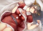  1girl bed_sheet belt belt_buckle black_belt black_hair blush brown_eyes buckle capelet cowboy_shot eyebrows_visible_through_hair hair_between_eyes hair_ornament hairband hairclip haruna_(kancolle) headgear highres kantai_collection long_hair long_neck looking_at_viewer nuka_(nvkka) open_mouth panties pillow pom_pom_(clothes) red_capelet santa_costume smile solo underwear white_panties 