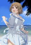  1girl bare_shoulders blue_dress blue_sky brown_eyes brown_hair cloud day dress flower from_behind hair_flower hair_ornament horizon idolmaster idolmaster_cinderella_girls looking_at_viewer looking_back mattaku_mousuke mimura_kanako off-shoulder_dress off_shoulder outdoors palm_tree puffy_short_sleeves puffy_sleeves short_sleeves sky solo tree twitter_username water white_flower 