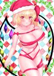  1girl areola_slip areolae argyle argyle_background blonde_hair blush breasts christmas covered_nipples cowboy_shot crystal flandre_scarlet hat highres kurenai_(anohitop) large_breasts looking_at_viewer naked_ribbon one_side_up red_eyes ribbon santa_hat smile solo touhou wings 