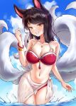  1girl ahri_(league_of_legends) akgrn animal_ears bikini blue_sky blush breasts brown_hair cleavage collarbone eyebrows_visible_through_hair facial_mark fox_ears fox_tail highres large_breasts league_of_legends long_hair looking_at_viewer multiple_tails navel ocean outdoors partially_submerged see-through sky solo swimsuit tail whisker_markings yellow_eyes 