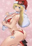  1girl ashiomi_masato ass back bag bare_shoulders bikini bikini_bottom bikini_top blonde_hair blue_eyes breasts butt_crack christmas closed_mouth collarbone eyebrows_visible_through_hair from_side fur_trim guilty_gear guilty_gear_strive hat high_heels highres holding holding_bag long_hair looking_at_viewer looking_to_the_side medium_breasts millia_rage pink_background red_footwear red_headwear santa_hat seiza sitting snowflakes swimsuit thighs 