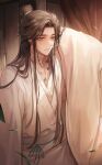  1boy bandaged_neck bandages brown_hair chinese_clothes hair_bun highres jewelry long_hair long_sleeves looking_to_the_side male_focus necklace orange_eyes parted_bangs ring robe tianguan_cifu very_long_hair white_hanfu white_robe wide_sleeves xie_lian young57440489 
