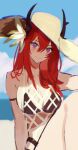  1girl arknights bare_shoulders beach bear_hat bikini black_bikini blush breasts cleavage closed_mouth collarbone commentary_request day demon_horns feet_out_of_frame hair_between_eyes horns large_breasts long_hair looking_at_viewer multico outdoors purple_eyes red_hair sitting smile solo stomach surtr_(arknights) swimsuit 