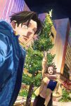  1boy 1girl building christmas christmas_lights christmas_tree facial_hair goatee gokushufudou highres husband_and_wife jacket kousuke_oono miku_(gokufushudou) outdoors pointing scar scar_across_eye scar_on_face scarf sky star_(sky) tatsu_(gokufushudou) 