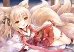  1girl :d animal_ear_fluff animal_ears bangs blonde_hair blush bow eyebrows_visible_through_hair eyes_visible_through_hair fox_ears fox_girl fox_tail hair_between_eyes hair_bow hair_over_shoulder highres japanese_clothes kata_rosu kimono kitsune kneehighs long_hair long_sleeves looking_at_viewer lying miniskirt multiple_tails on_side original red_ribbon red_skirt ribbon skirt smile solo tail thigh_ribbon two_side_up white_legwear wide_sleeves yellow_eyes 