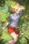  1girl alpaca_carlesi bianca_(pokemon) blonde_hair collared_shirt glasses grass green_eyes hat hat_removed headwear_removed highres looking_at_viewer lying on_back on_grass open_mouth poke_ball pokemon pokemon_(game) red_shorts shirt shorts solo teeth upper_teeth white_shirt 