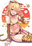  1girl 2022 animal_ear_fluff animal_ears animal_print bangs bikini blonde_hair blush breasts choker cleavage collarbone commentary_request detached_sleeves eyebrows_visible_through_hair fake_animal_ears fur_trim gloves gyaru hair_over_one_eye highres jewelry kouzuki_tsubasa_(musou_kaidou) looking_at_viewer medium_breasts navel necklace new_year open_mouth original red_choker red_eyes red_nails short_hair sitting skindentation smile solo swimsuit tail thighhighs tiger_ears tiger_print tiger_stripes tiger_tail 