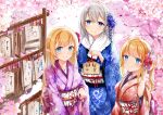  3girls bangs blonde_hair blue_eyes blue_flower blue_kimono bow branch closed_mouth commentary_request ema eyebrows_visible_through_hair floral_print flower grey_hair hair_between_eyes hair_flower hair_ornament hand_up highres holding japanese_clothes kimono long_hair multiple_girls mutang nengajou new_year obi original petals pink_flower pink_kimono print_kimono red_bow red_kimono sash side_ponytail smile very_long_hair 