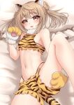  1girl absurdres alternate_costume animal_ears animal_hands animal_print bangs bare_shoulders bed_sheet bikini blush cat_ears cat_tail chinese_zodiac commentary_request fake_animal_ears fake_tail gloves hair_bun highres holding_leg kantai_collection light_brown_hair looking_at_viewer lying makura_(user_jpmm5733) michishio_(kancolle) midriff navel on_back on_bed open_mouth paw_gloves short_shorts short_twintails shorts solo spread_legs swimsuit tail tiger_ears tiger_print tiger_tail twintails year_of_the_tiger yellow_eyes 