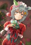  1girl animal_ears autumn_leaves_(tail_fox) bangs blue_choker blue_eyes blurry blurry_background blush capelet choker christmas christmas_ornaments christmas_tree closed_mouth commentary depth_of_field dress dutch_angle ear_ornament eyebrows_visible_through_hair fur-trimmed_capelet fur_trim gift grey_hair hair_ornament half-closed_eyes hat highres holding holding_gift horse_ears horse_girl long_sleeves looking_at_viewer red_capelet red_dress red_headwear santa_dress santa_hat seiun_sky_(umamusume) short_hair smile solo standing umamusume 