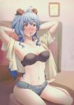  1girl absurdres ahoge armpits arms_up bandeau bangs bare_legs barefoot beige_shirt blue_hair blush bra breasts collarbone commentary_request er_gou_daoren eyebrows_visible_through_hair ganyu_(genshin_impact) genshin_impact grey_shorts hair_between_eyes hair_tie_in_mouth highres horns indoors long_hair looking_at_viewer medium_breasts micro_shorts mouth_hold navel nose_blush open_clothes open_shirt purple_eyes short_sleeves shorts sitting solo stomach strapless strapless_bra thighs underwear very_long_hair wariza 