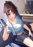  1girl absurdres bangs between_legs black_shorts blue_shirt blurry blurry_background breasts brown_eyes brown_hair can cleavage commentary_request couch day eyes_visible_through_hair from_above hair_tie highres holding holding_can indoors kagematsuri large_breasts legs_apart lips looking_at_viewer midriff original parted_lips ponytail shirt short_hair shorts sitting solo swept_bangs tied_hair twitter_username 