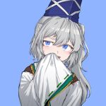  1girl :d ast.rockett bangs blue_background blue_eyes blue_headwear covering_mouth eyebrows_visible_through_hair floppy_sleeves green_ribbon hair_between_eyes hand_up hat highres japanese_clothes kariginu light_blush long_hair looking_to_the_side mononobe_no_futo ponytail raised_eyebrow ribbon ribbon-trimmed_sleeves ribbon_trim silver_hair simple_background sleeves_past_fingers sleeves_past_wrists smile solo tate_eboshi touhou upper_body white_ribbon 