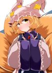  1girl absurdres animal_ears blonde_hair blue_tabard blush dress eyebrows_visible_through_hair eyelashes fox_ears fox_tail frills hands_in_opposite_sleeves hat head_tilt highres long_sleeves looking_at_viewer multiple_tails no_nose pillow_hat short_hair simple_background solo tabard tail tassel touhou white_background white_dress wide_sleeves yakumo_ran yasui_nori yellow_eyes 