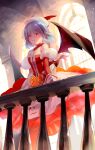  1girl alternate_costume bangs bare_shoulders bat_wings beret blue_hair breasts commentary_request dress grin hat heart highres indoors long_sleeves looking_at_viewer off-shoulder_dress off_shoulder parted_lips railing red_dress red_eyes remilia_scarlet short_hair small_breasts smile solo standing touhou white_headwear window wings yuki_(popopo) 