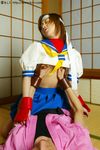  1girl capcom cosplay cowgirl_position girl_on_top hibiki_dan kasugano_sakura photo real sex straddling street_fighter vaginal 