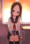  1girl absurdres arm_support bangs black_legwear black_sailor_collar black_skirt box brown_eyes brown_hair chair closed_mouth commentary_request desk feet_out_of_frame forehead gift gift_box head_tilt highres holding holding_box holding_gift indoors karakai_jouzu_no_takagi-san kneehighs long_hair long_sleeves looking_at_viewer neckerchief on_chair parted_bangs pleated_skirt red_neckerchief sailor_collar school_chair school_desk school_uniform serafuku sitting skirt smile solo sunset takagi-san valentine window yamamoto_souichirou 