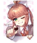  1girl ;) brown_hair candy chocolate commentary doki_doki_literature_club english_commentary eyebrows_visible_through_hair food green_eyes grey_jacket hair_ribbon happy_valentine heart heart-shaped_chocolate highres jacket long_hair long_sleeves looking_at_viewer mixed-language_commentary monika_(doki_doki_literature_club) nan_(gokurou) one_eye_closed parted_lips polka_dot polka_dot_background ponytail reaching_out ribbon school_uniform smile solo through_screen valentine watermark white_ribbon 