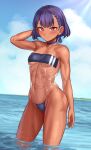  1girl absurdres arm_behind_head arm_up bangs blunt_ends blush bob_cut braid breasts casual_one-piece_swimsuit caustics choker collarbone contrapposto covered_navel dark-skinned_female dark_skin day english_commentary eyebrows_visible_through_hair gris_swimsuit hair_behind_ear highleg highleg_swimsuit highres hip_bones horizon looking_at_viewer meme_attire navel ocean one-piece_swimsuit original outdoors purple_hair red_eyes see-through short_hair side_braid small_breasts smile solo standing strapless strapless_swimsuit sunlight swimsuit toin_(koto54576897) underboob wading water wet 
