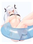  1girl absurdres anchor_ornament anchor_symbol azur_lane bangs bikini black_bikini breasts eyebrows_visible_through_hair hair_ribbon highres innertube large_breasts legs_up looking_at_viewer multicolored_hair prinz_eugen_(azur_lane) prinz_eugen_(unfading_smile)_(azur_lane) red_eyes ribbon shirafuji_ene side-tie_bikini simple_background sitting skindentation solo streaked_hair swept_bangs swimsuit thigh_strap thighs two_side_up underboob white_background white_hair 