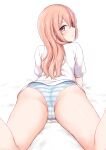  1girl ass bangs bare_legs blush brown_eyes cai_geng cameltoe closed_mouth commentary_request crotch eyebrows_visible_through_hair highres inui_sajuna legs_up long_hair looking_at_viewer looking_back lying on_stomach orange_hair panties shirt short_sleeves simple_background solo sono_bisque_doll_wa_koi_wo_suru striped striped_panties thighs underwear white_background white_shirt 