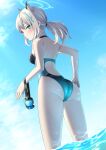  1girl animal_ear_fluff animal_ears ass blue_archive blue_eyes blue_sky cloud commentary_request competition_swimsuit cross_hair_ornament from_behind goggles goggles_removed grey_hair hair_ornament halo highres low_twintails medium_hair menbou_(menbow3v) one-piece_swimsuit shiroko_(blue_archive) sky soaking_feet solo swimsuit twintails water 