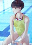  1girl bangs black_hair bob_cut bottle breasts closed_mouth collarbone competition_swimsuit day from_above goggles goggles_around_neck highres holding holding_bottle indoors kaoming looking_at_viewer looking_up medium_breasts one-piece_swimsuit original pool reflection see-through shakujii_tsubasa short_hair sitting smile solo swimsuit thighs wet yellow_swimsuit 