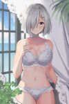  1girl blue_eyes blue_sky blush bra breasts choker cleavage collarbone day frilled_bra frilled_panties frills hair_ornament hair_over_one_eye hairclip hamakaze_(kancolle) hand_on_own_chest highres indoors kantai_collection large_breasts lingerie looking_at_viewer natsume_(natsume_melio) panties short_hair silver_bra silver_hair silver_panties sky smile solo underwear window 