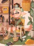  1girl animal_slippers blanket book book_stack bottle cable closed_eyes commentary_request cup earrings food-themed_earrings green_shirt hair_ornament hairclip highres indoors inkling inkling_girl inkling_player_character jacket jewelry lemo_(lemo_4) medium_hair nintendo_switch on_chair open_book paint_roller pencil plaid_blanket plant pointy_ears potted_plant shelf shirt sitting slippers smallfry_(splatoon) splatoon_(series) splatoon_3 table tentacle_hair thick_eyebrows tissue tissue_box yellow_jacket 
