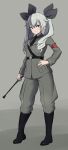  1girl anchovy_(girls_und_panzer) anzio_military_uniform bangs belt black_belt black_footwear black_neckwear black_ribbon black_shirt boots closed_mouth commentary dress_shirt drill_hair full_body girls_und_panzer green_hair grey_jacket grey_pants hair_ribbon hand_on_hip highres holding jacket knee_boots kuzu010 long_hair long_sleeves looking_at_viewer military military_uniform necktie pants red_eyes ribbon riding_crop sam_browne_belt shirt simple_background smile solo standing twin_drills twintails uniform wing_collar 